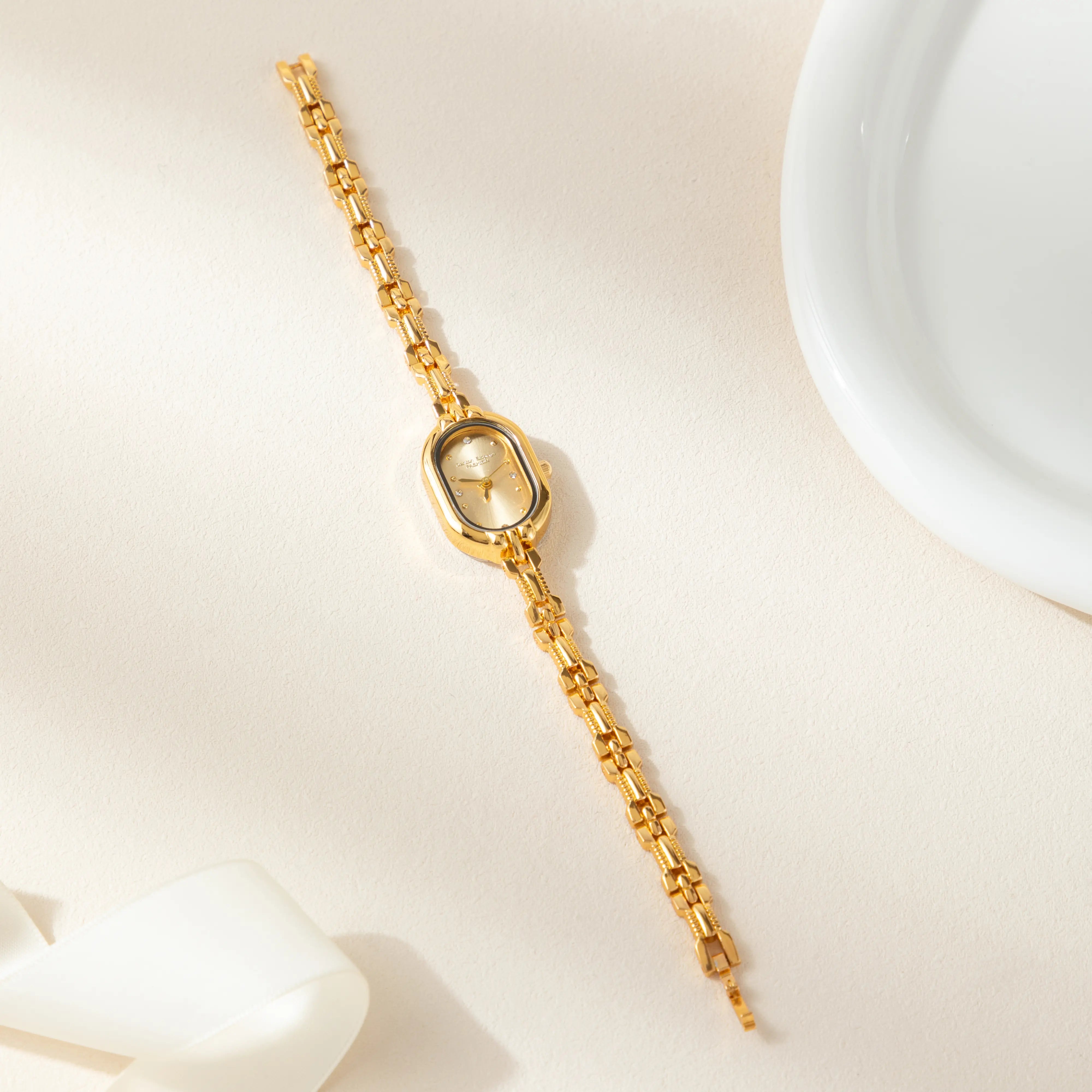 Helena® - Elegant Gold Watch Featuring an Oval Dial and Sleek Black Frame – view 4