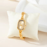 Helena® - Elegant Gold Watch Featuring an Oval Dial and Sleek Black Frame – view 5