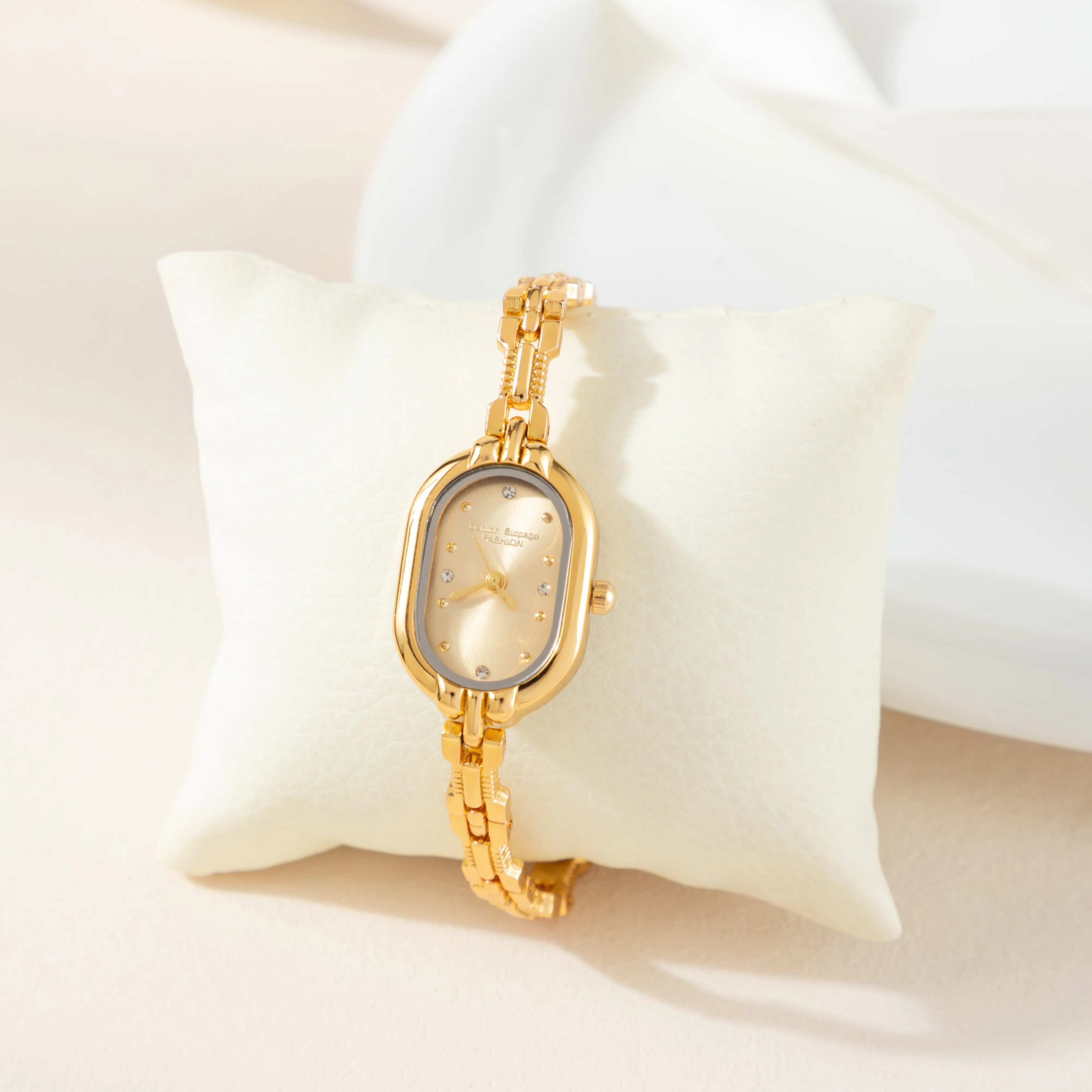Helena® - Elegant Gold Watch Featuring an Oval Dial and Sleek Black Frame – view 5