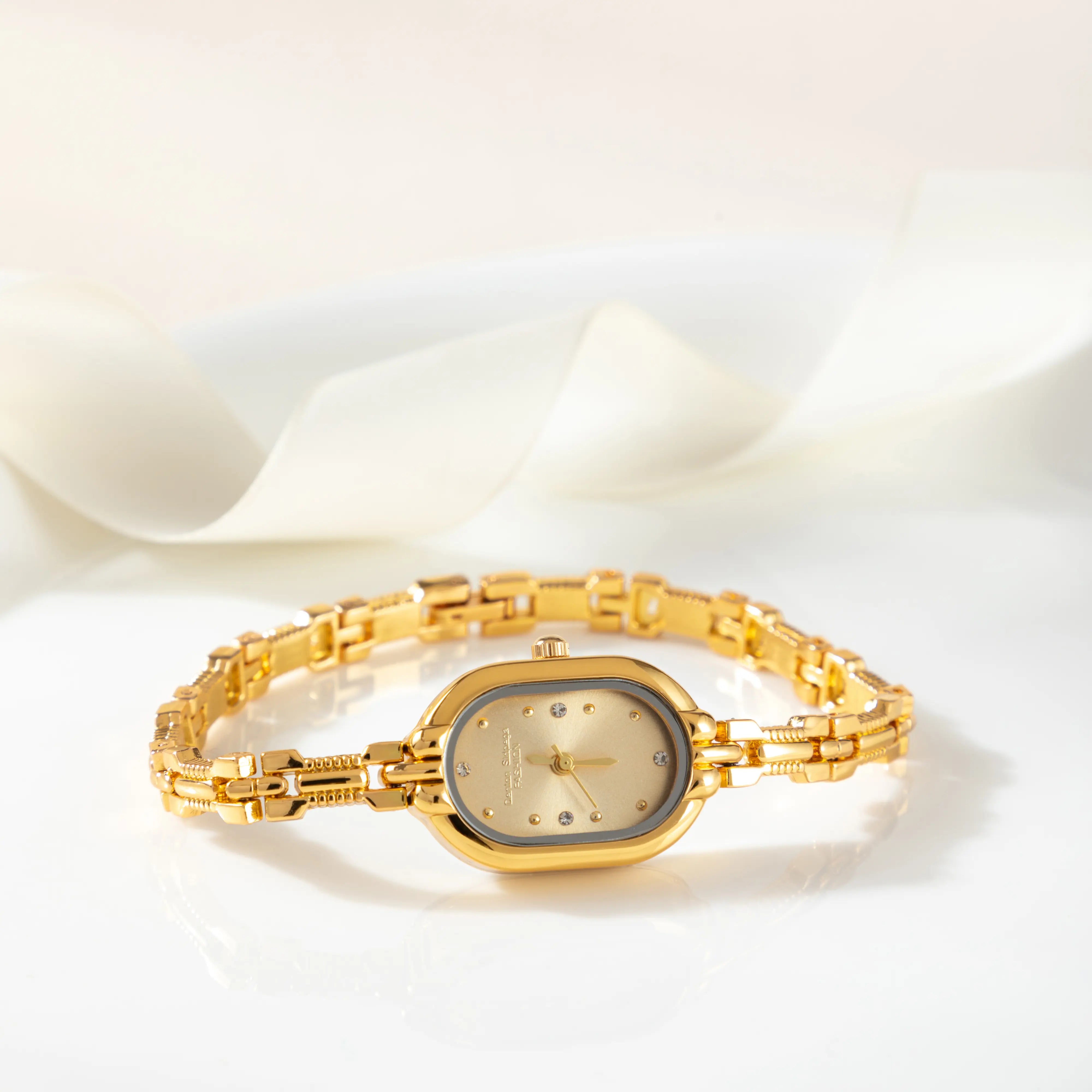 Helena® - Elegant Gold Watch Featuring an Oval Dial and Sleek Black Frame – view 3