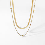 Claire – Elegant Double-Row Gold Necklace with a Contemporary Luster