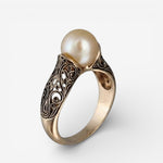 Classic Gold Ring Featuring a Pearl