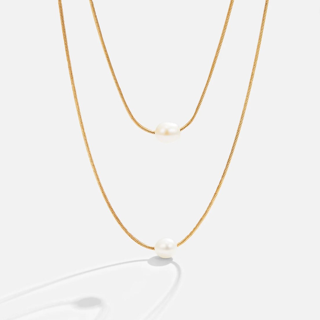 Caroline – Double Row Gold Chain with Dark Gemstone